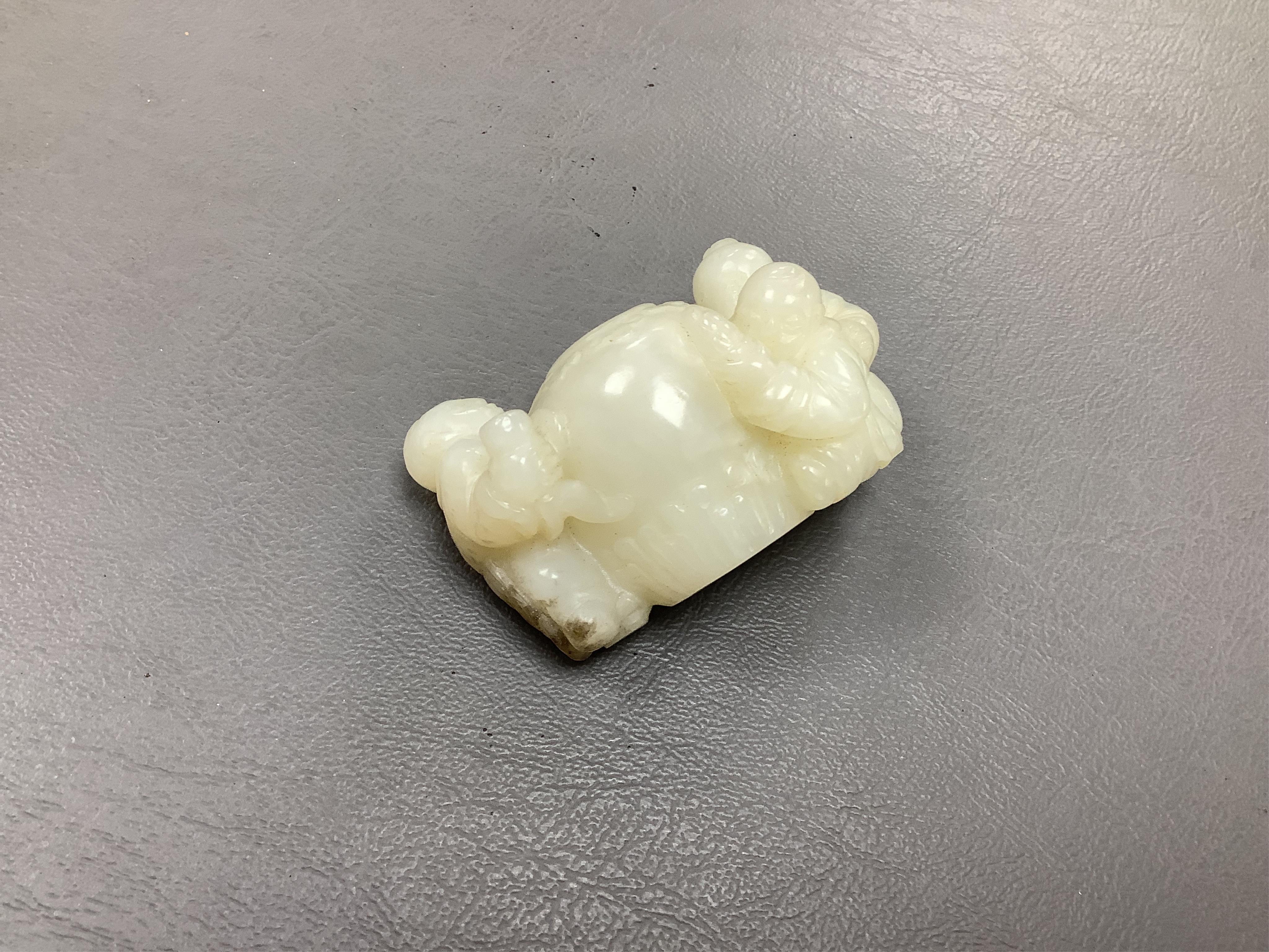 A Chinese white jade 'boys with jar' carving and three shoushan stone figures; luohan, girl with squirrel and mermaid (4), tallest 11cm